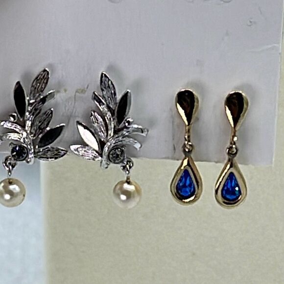 Avon Jewelry - Two pair vintage Avon clip earrings. One silver and one gold colored